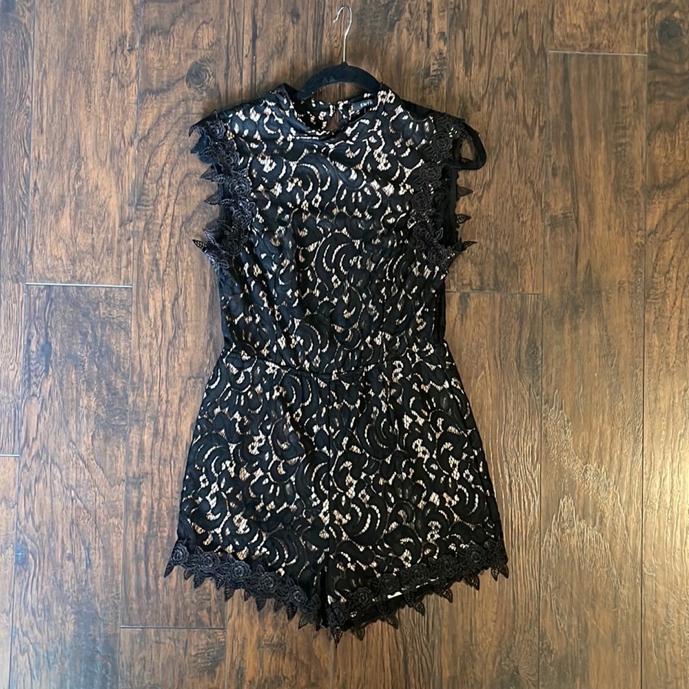 Beautiful black lace romper with beautiful detailed cut out in the back